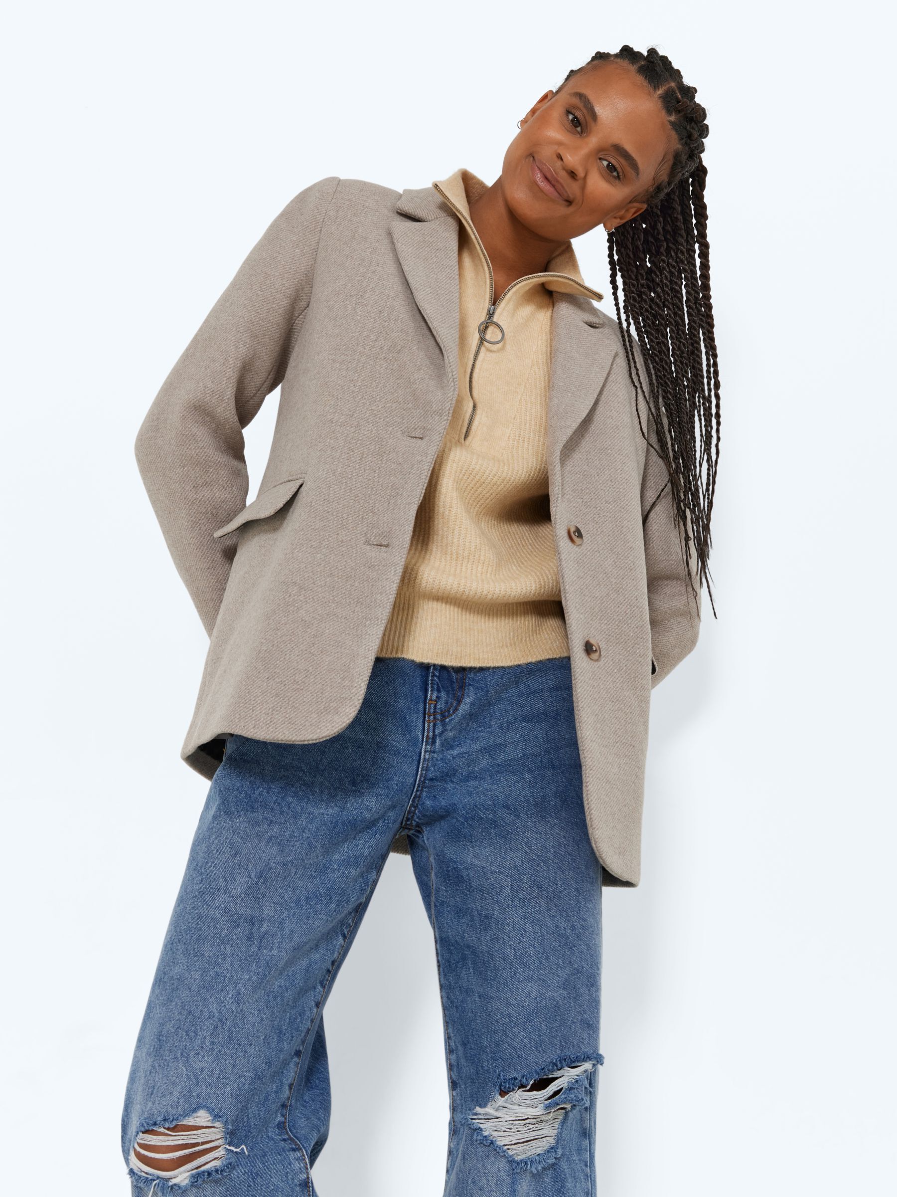Beige blazer and jeans on sale